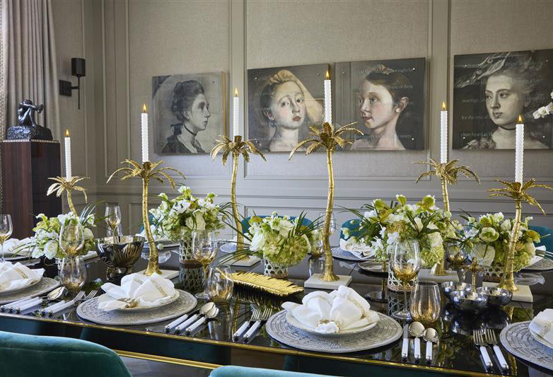 Designer placemats styled over a glass dining table protector — proof that protection and polish can coexist