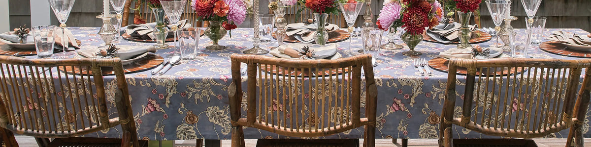 Kim Seybert Luxury Mira Tablecloth with round Bamboo Placemats and Cosmos Napkin Ring