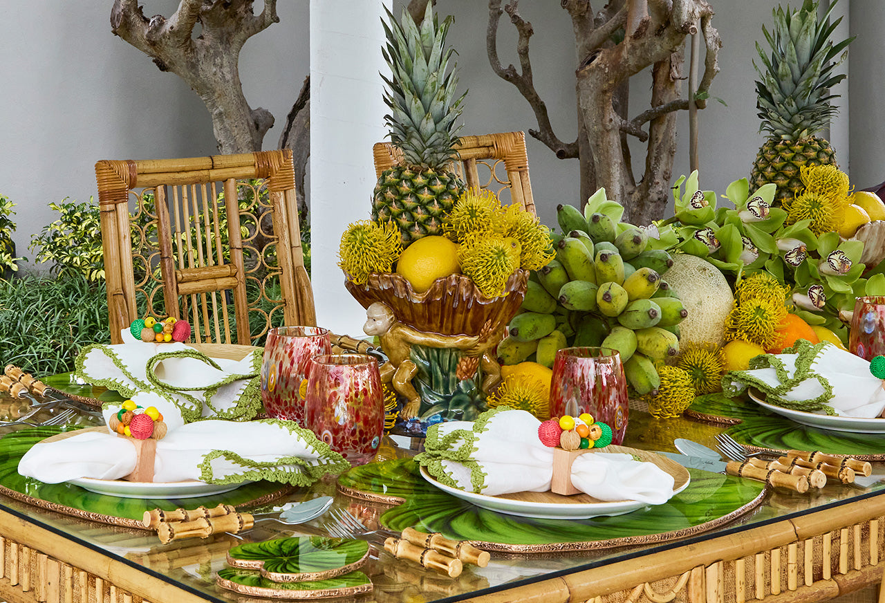 tropical cinco de mayo table setting with fruit centerpiece