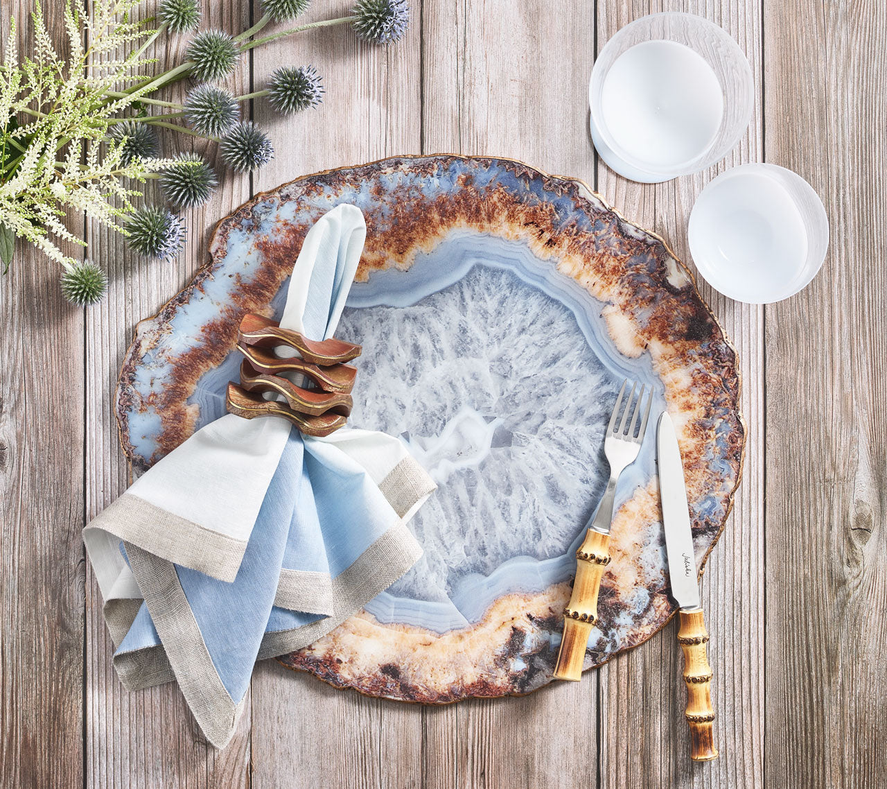 Kim Seybert's Cork Backed Strata Placemats in shades of Gold, Gray and Blue