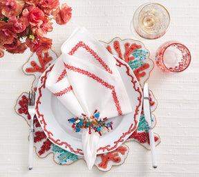 Kim Seybert Luxury Jardin Napkin in White & Coral with coral spray placemat and napkin ring