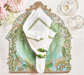 Green and blue beaded Arbor Placemat underneath a plate and napkin of the same colors