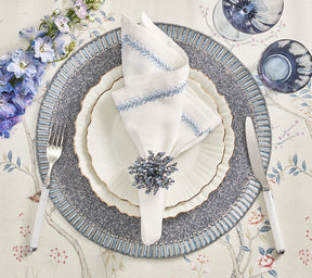 Round Bevel Placemat in periwinkle with glass and acrylic beads arranged in a pavŽ pattern. 