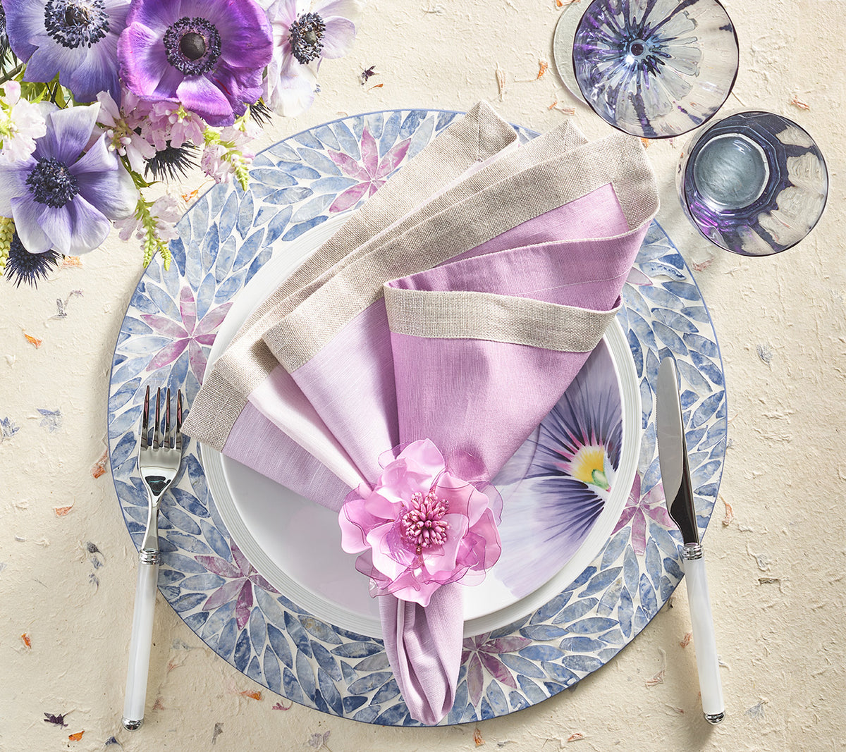 Lilac Gardenia Napkin Ring fashioned after the flower of the same name, which sits on a beaded ring base