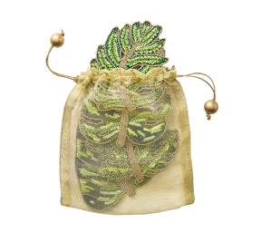 Green, beaded Kim Seybert Luxury Laurel Drink Coasters in a gift bag