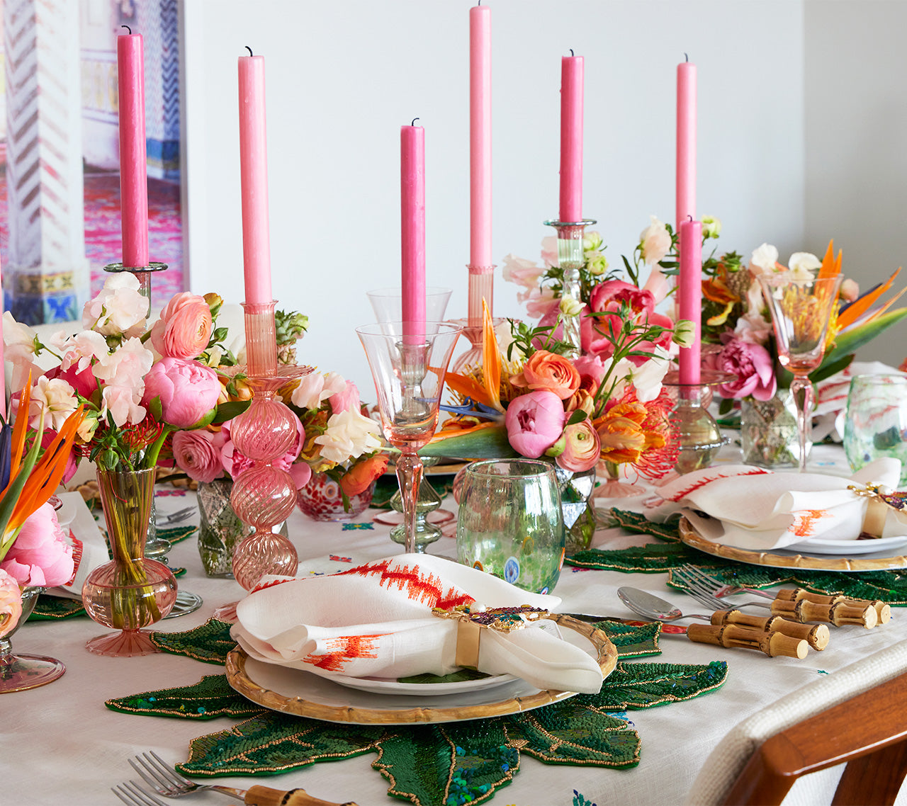 Table with seven Iris Tall Candle Holders and candles in blush 