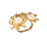 Marigold Napkin Ring in gold featuring a brass marigold flower with a quartz center