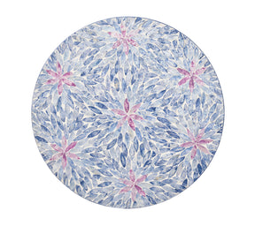 Round Flora Placemat in lilac and periwinkle with Capiz shells fashioned in the form of a spring flower. 