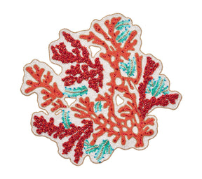 Round Coral Spray Placemat hand-beaded with red and turquoise glass, plastic and chip beads. 