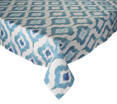 Linen Watercolor Ikat Tablecloth with a bright blue, geometric pattern inspired by traditional Indonesian Ikat textile-making process. 