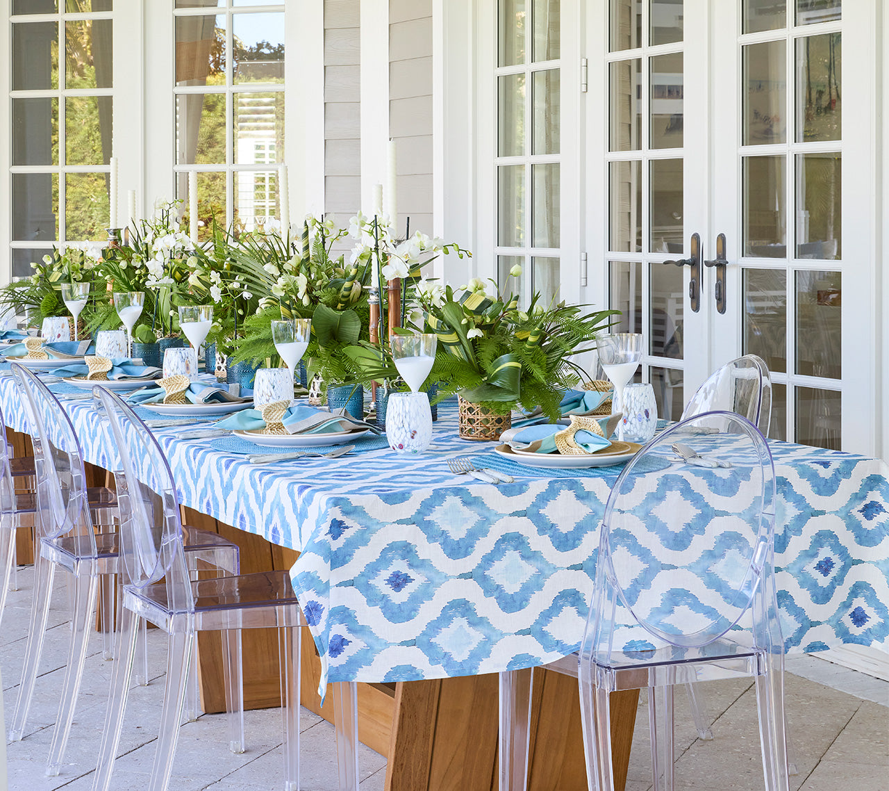 Linen Watercolor Ikat Tablecloth with a bright blue, geometric pattern inspired by traditional Indonesian Ikat textile-making process.